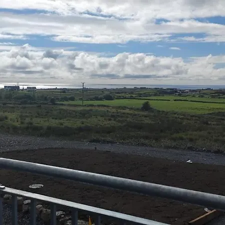 An Toilean Balcony With Distant Sea Views *